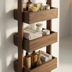 Wooden wall-mounted shelf with bathroom products in a tiled bathroom.