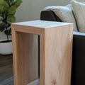 Custom solid white oak side table with a seamless waterfall edge