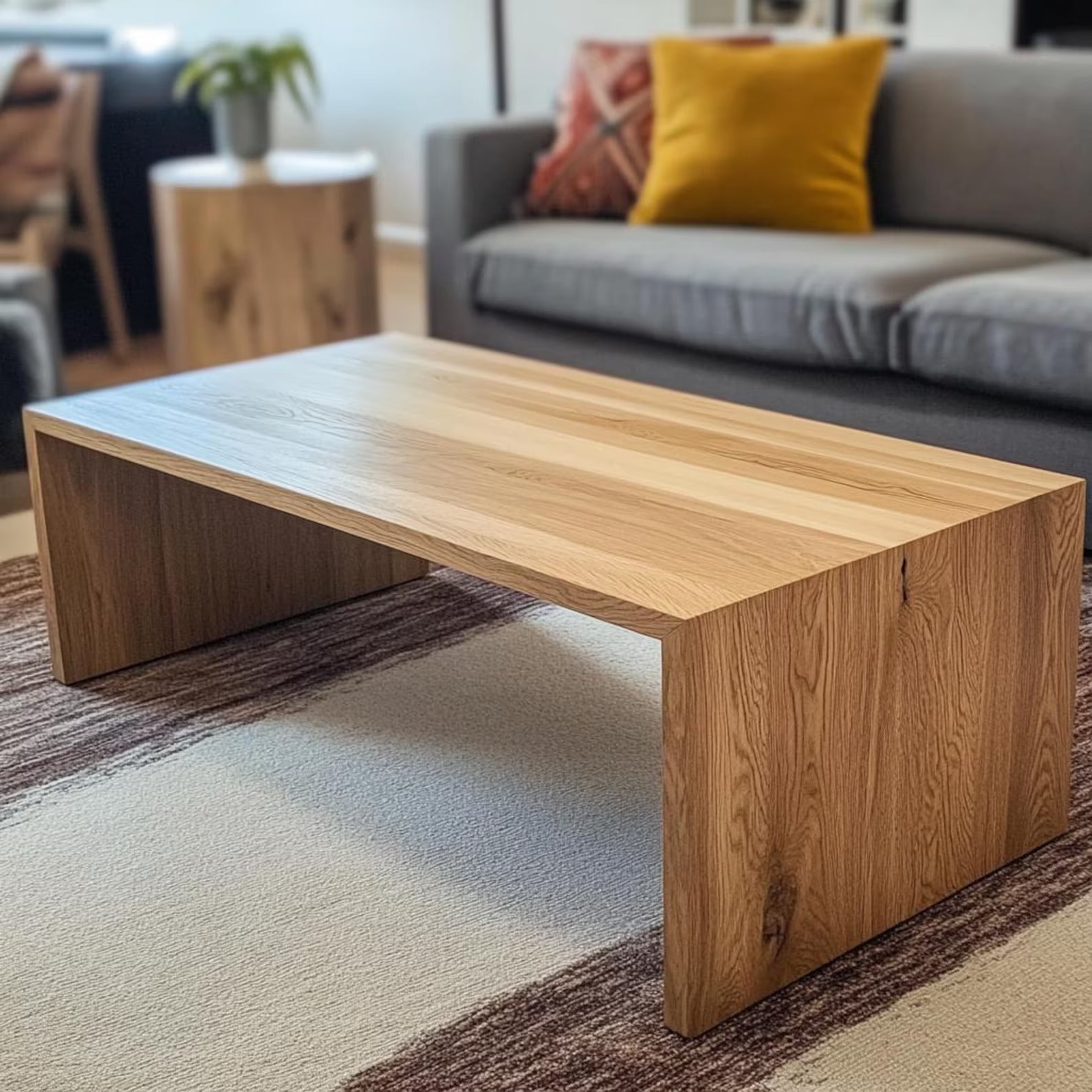 Minimalist white oak waterfall coffee table for contemporary living rooms
