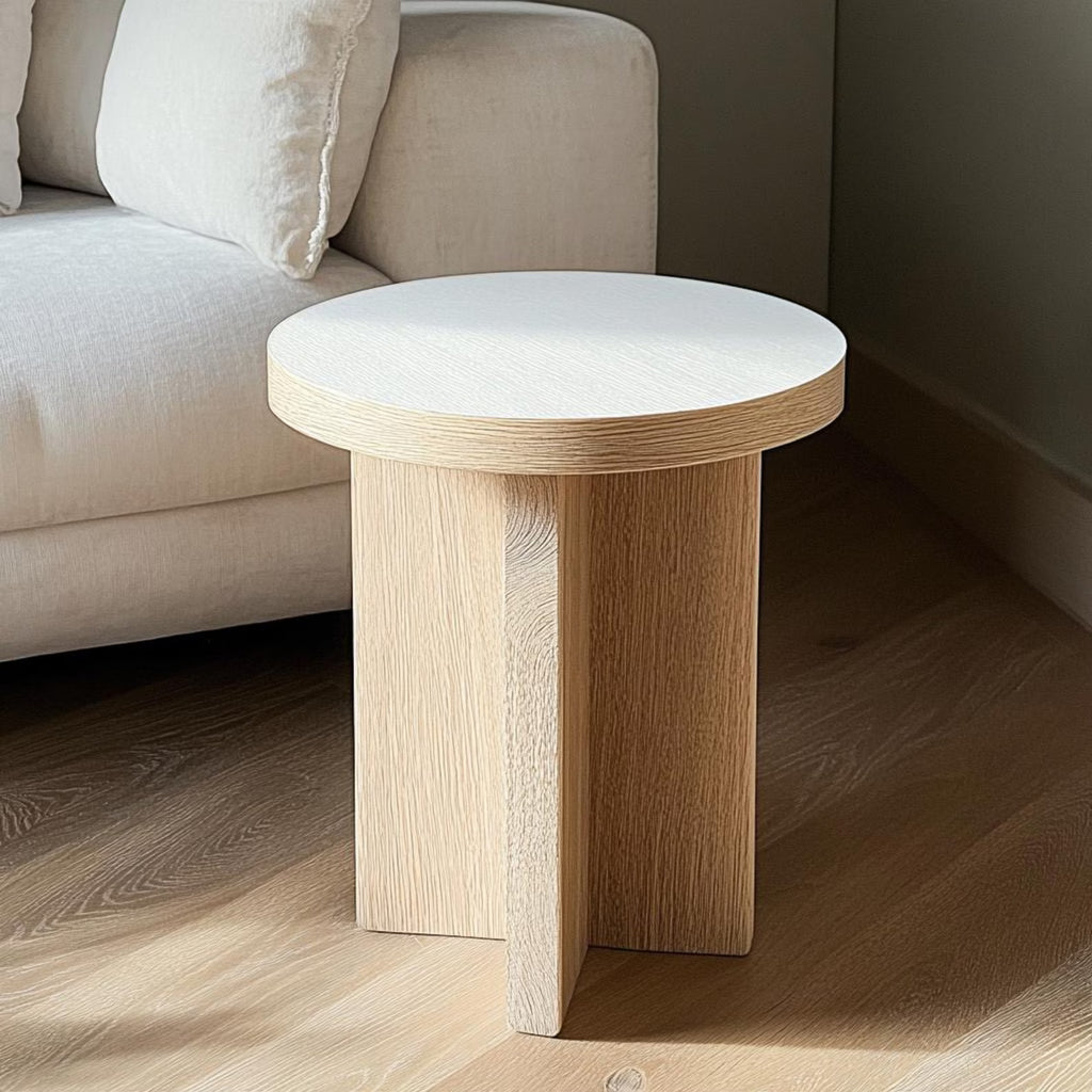 Handcrafted round white oak side table with a modern design in modern living room