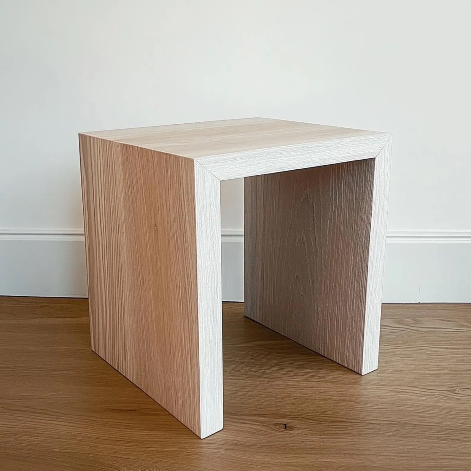Custom-built white oak side table with clean lines and a sleek finish