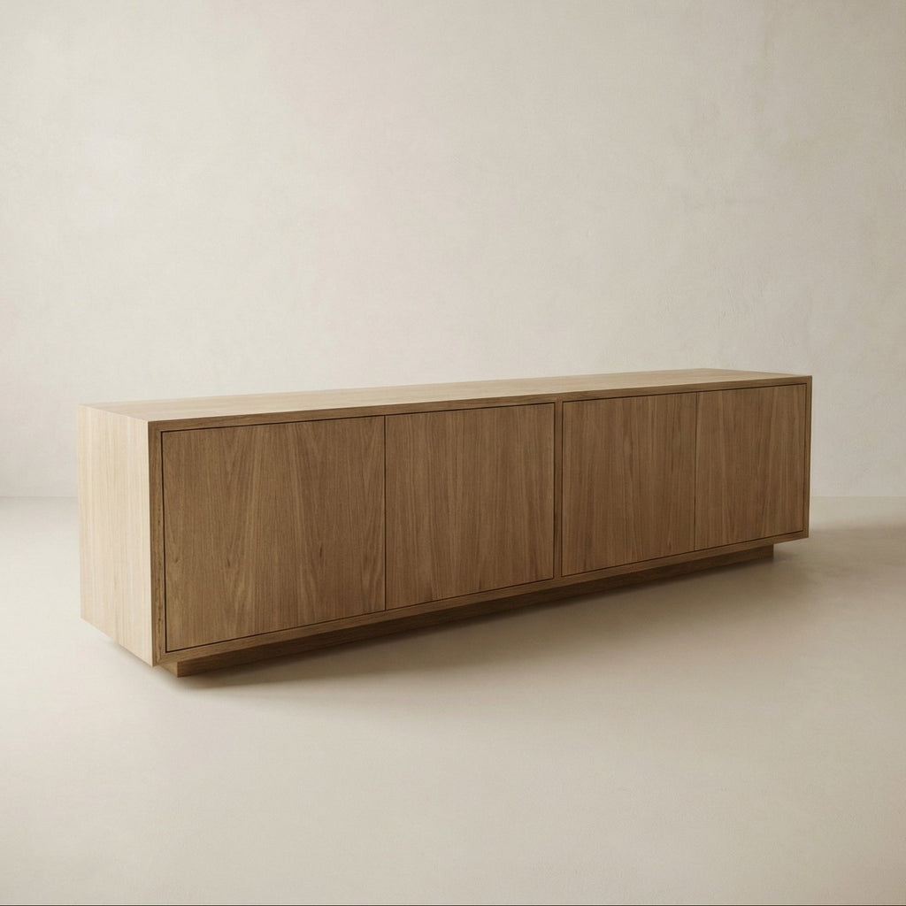 Wooden sideboard against a plain wall